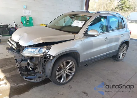 2012 Volkswagen Tiguan Sel z USA, uszkodzony, nr VIN WVGAV7AX9CW531897